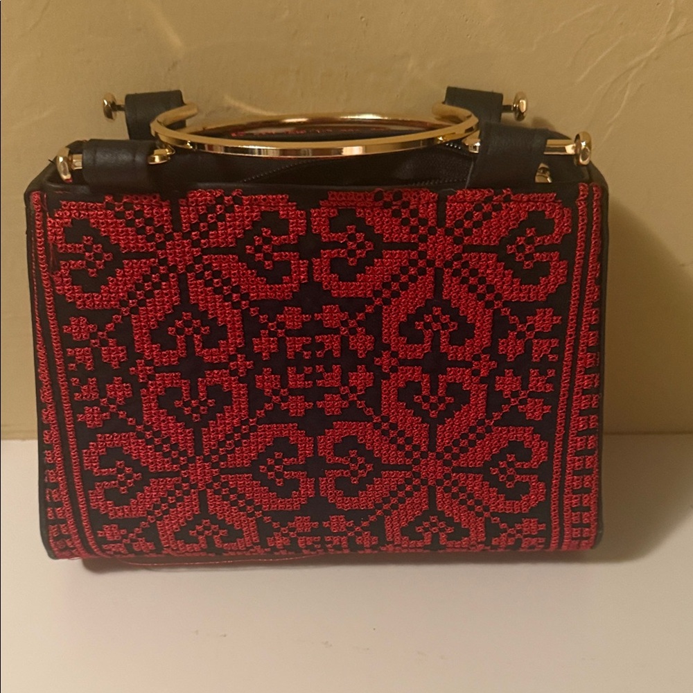 Chic Red and Black Clutch with Gold Accents